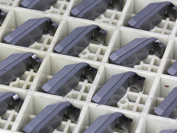 Carbide inserts on the machining line